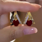 🔥Novità 2026 e Best Seller🔥 Eleganti orecchini a cerchio pendenti a forma di cuore e V