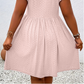 Abito da donna con scollo a V e volant