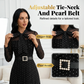 Elegante abito midi a pois con collo annodato