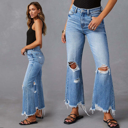 Jeans a zampa strappati a vita alta da donna