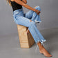 Jeans a zampa strappati a vita alta da donna