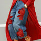 Jeans da donna a gamba larga con stampa floreale artistica.
