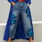 Jeans da donna a gamba larga con stampa floreale artistica.