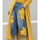 Jeans da donna a gamba larga con stampa floreale artistica.