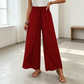 Pantaloni da donna a gamba larga con spacco e vita arricciata