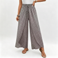 Pantaloni da donna a gamba larga con spacco e vita arricciata