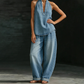 Completo casual da donna con top allacciato al collo e pantaloni a gamba larga