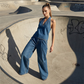 Completo casual da donna con top allacciato al collo e pantaloni a gamba larga