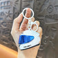 Portachiavi a forma di mini casco da moto
