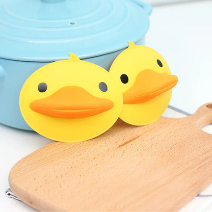 Tappetino in silicone resistente al calore a forma di paperella gialla