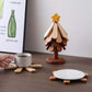 Sottopentola in legno a forma di albero con stella o mela