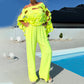 Completo con top cut-out e tuta a fascia