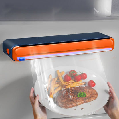 Dispenser ricaricabile con taglierina per pellicola trasparente
